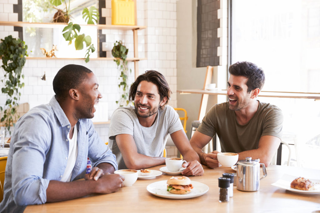 Group of guys at breakfast (Evolve Addiction Treatment)